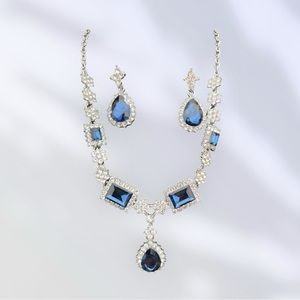 Blue stone necklace and pair of earrings